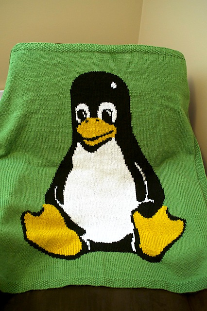 Image of the completed Tux baby blanket!