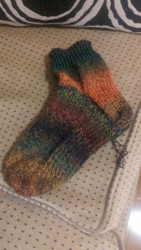The completed knitted sock before the ends are buried. The distinctive feature of this sock is a reinforced bottom using heel stitch that I hope will be more durable.