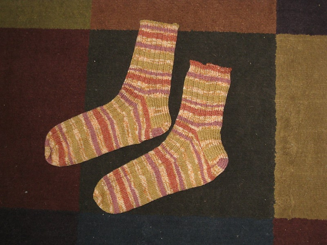 Photo of the completed pair of socks... they almost match!